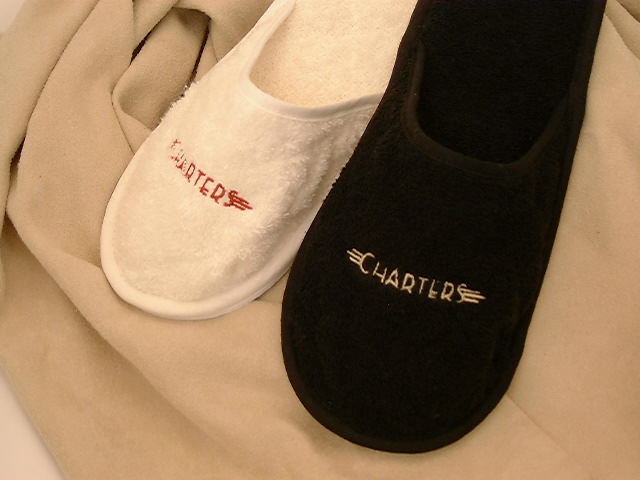 Save Your Valuable Floors From Grit and Heels With Essanti Slippers. Even Promote Your Property With A Logo!